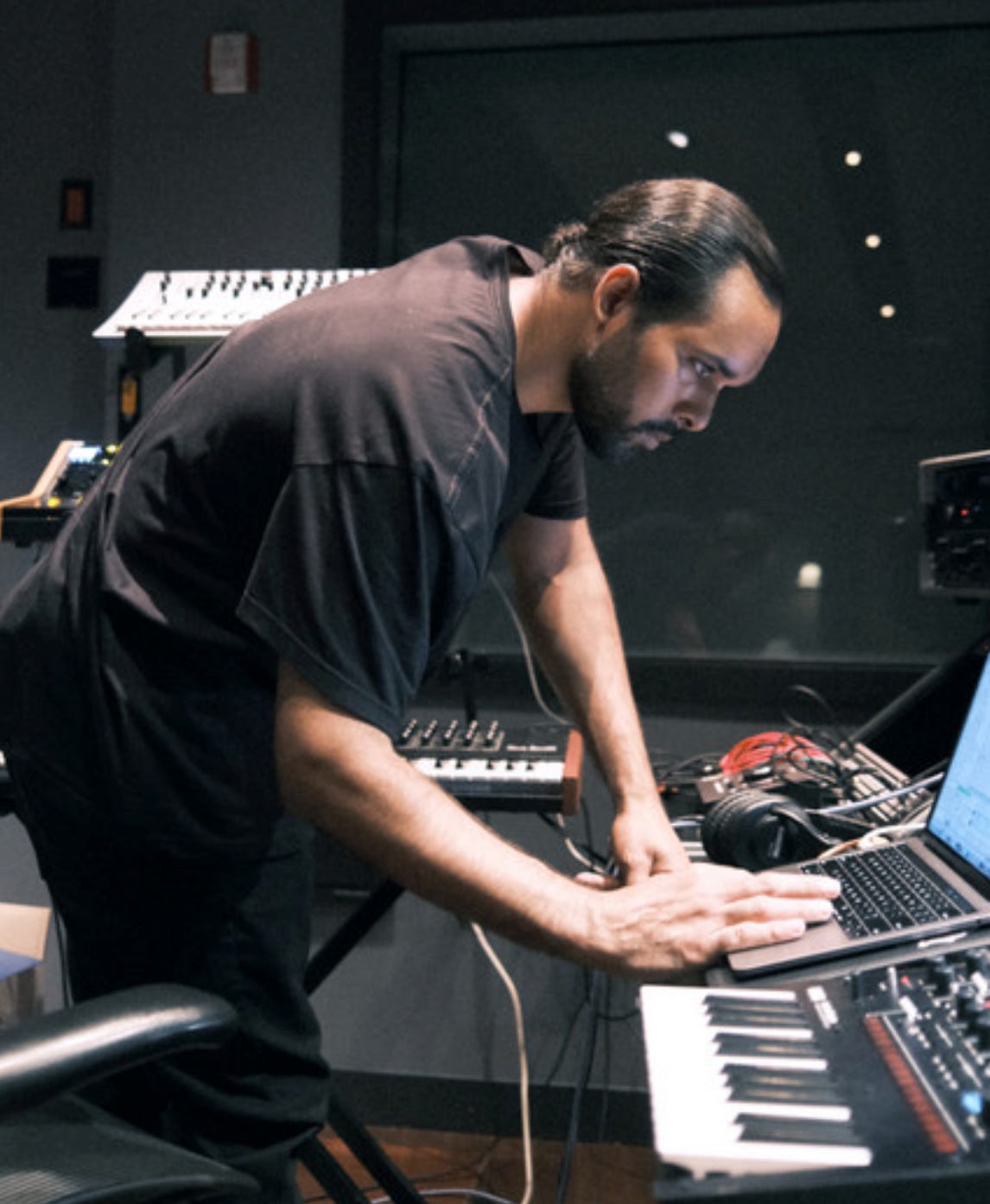 K.Fisha working in the studio